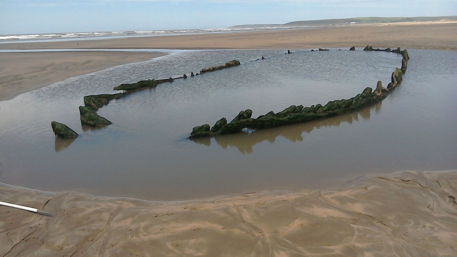 The newly protected Westward Ho! Wreck on Northam Burrows Sands. It is believed to be the remains of the 'Sally', which ran aground on the sands in 1769, while bound from Oporto in Portugal to Bristol with a cargo of port wine.