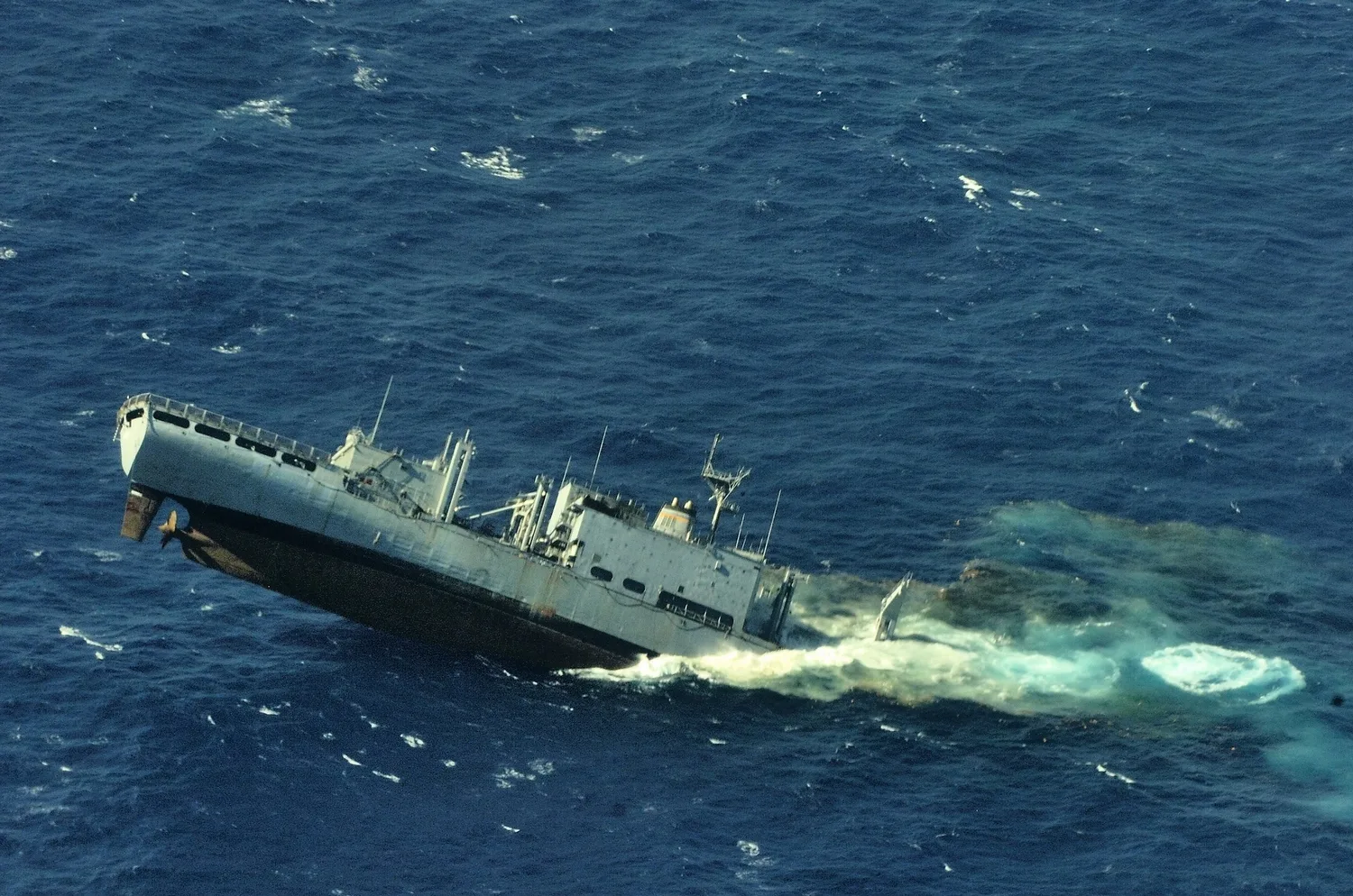 English/Anglais IS2012-2003-130 17 July 2012 Kauai County, Hawaii, USA USNS Concord (T-AFS-5) is used as a target vessel for Her Majesty's Canadian Ship (HMCS) Victoria (SSK 876) during a sink exercise (SINKEX) at the Pacific Missile Range Facility Barking Sands, in Kauai County, Hawaii, on July 17 2012. 1,400 Canadian sailors, soldiers, and airmen and airwomen participate in the Rim of the Pacific (RIMPAC) 2012 combined and joint exercise taking place near the Hawaiian Islands from June 29 to August 3. Scheduled and coordinated by the U.S. Navy Third Fleet, RIMPAC also offers Canada the senior members of the Canadian Forces the opportunity to assume positions of leadership, further enhancing Canada’s ability to work with other nations of the Asia-Pacific region. Rim of the Pacific (RIMPAC) is the world’s largest international maritime exercise, designed to prepare military forces to work together in missions ranging from providing humanitarian aide to full combat operations. RIMPAC began as an annual exercise in 1971 and since 1974 has been scheduled every other year. The endurance of exercise demonstrates the value of bringing international forces together to train and improve their ability to operate in a joint and combined multi-national force environment. Canada, along with only Australia and the United States, has participated in RIMPAC since its inception. Canadian Forces photo by : 407 Long Range Patrol Squadron, Comox, BC © 2012 DND-MDN Canada