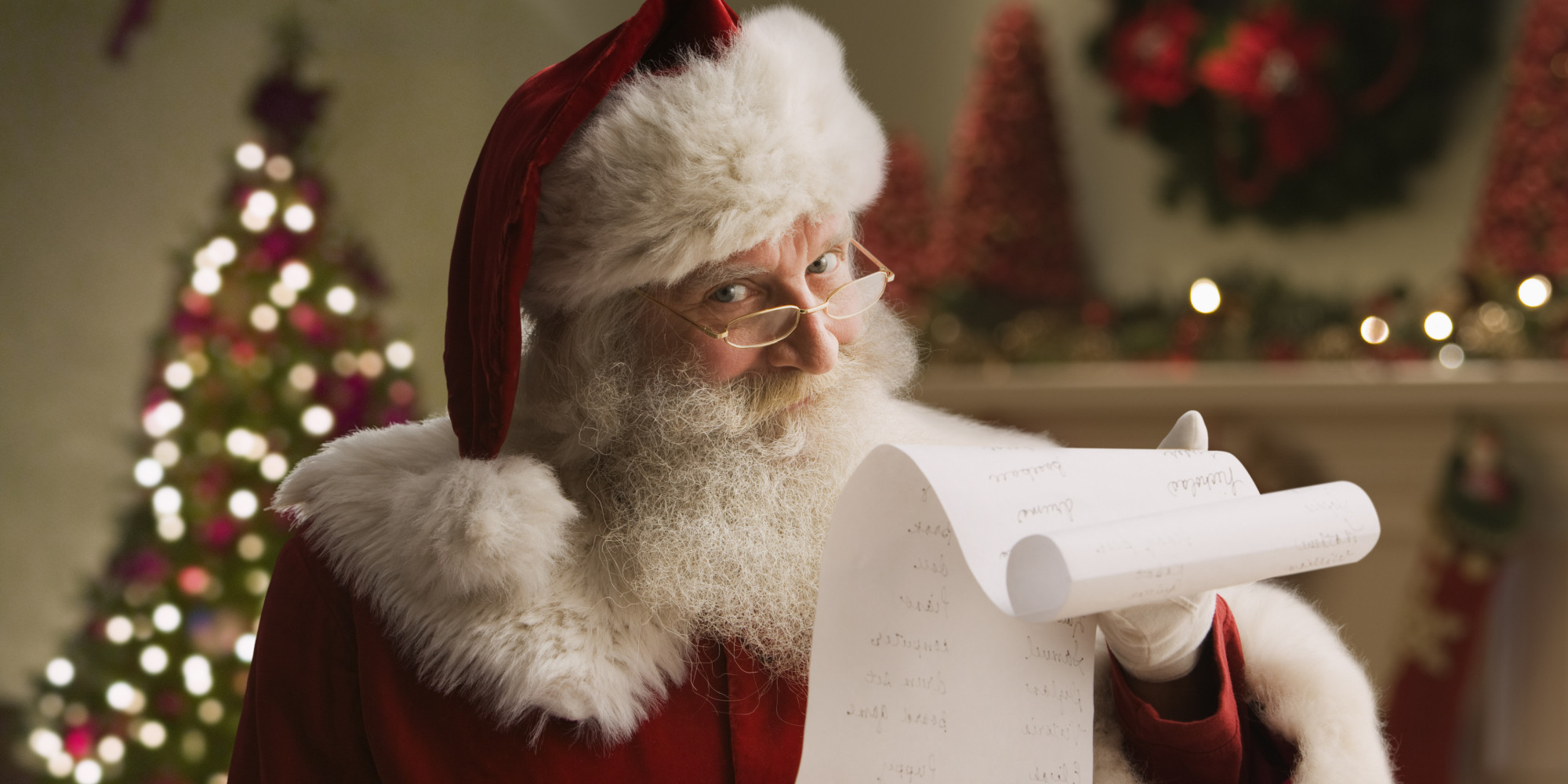 Santa Claus with checklist, portrait, close-up